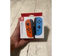 Nintendo Joy-Con Controllers Pair - Neon Red/ and Blue Brand new
