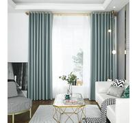 Noise dampening blackout curtains with energy efficient insulation, designed to keep rooms quiet and comfortable throughout the year (blue)