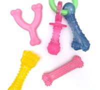 Nylabone New Puppy Chew Toy Bundle Toys for Teething Puppies Chicken & Bacon Flavors Pink X-Small - Up to 15 lbs 4 Pack