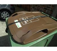 OasisBinStrap x 2. (BLACK) Stops wind blowing wheelie bin lid, keeps out animals and deters neighbours from putting their rubbish in your bin. Easy to fit, no drilling, and easy to operate..