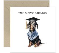 Old English Co. Cute Graduation Card for Him or Her - 'Clever Sausage' Daschund Dog Graduation Cap Gown Card - Humorous Well Done Passed Exams Card for Son, Daughter, Sister, Brother, Grandchild