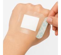 Opsite Post-Op Waterproof Adhesive Film + Pad Dressing 6.5cm x 5cm, Pack of 25 | Breathable Construction | Absorbent + Gentle | Transparent + Low Trauma