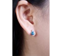 Outrage London Women's Blue Topaz Birthstone Stud Earrings in Silver Outrage London Silver One Size