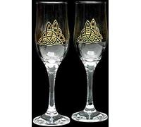 Pair of Champagne Flutes in a Green Celtic Eternity Knot Design. Handpainted and designed in the UK by Beverley Gallagher, these significant and expressive gifts are ideal for Christmas, Valentine's Day, Mother's Day, St Patrick's Day, Easter, birthdays, anniversaries, weddings, engagements and special celebrations.