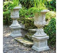 Pair of Large Victorian Stone Cast Urns with Plinths