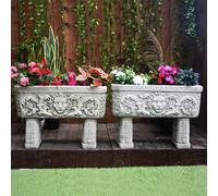 Pair of Lion design Stone Troughs on legs