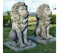 Pair of stunning large sitting lion statues
