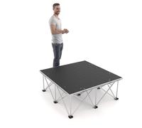 PD X-Lite750 1m x 1m x 40cm portable modular stage riser system with slip-resistant black aluminium deck, waterproof plywood top, and lightweight folding legs for fast setup at live events