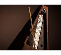 Perceiving and Moving to a Rhythmic Beat