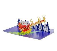 PopOra - Santa Sleigh 3D Pop-Up Christmas Card | Santa & Reindeer Flying Over Snowy Village Scene | Handmade Xmas Greeting Card with Message Insert & Envelope | Festive Keepsake for Family & Friends
