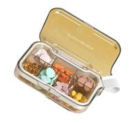 Portable pill organizer box with 4 or 7 compartments for daily medication management and travel convenience