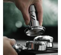 Professional coffee tamper with spring loaded pressure system delivering consistent force, magnetic centering for portafilter sizes 51 53 58mm, and stainless steel durability (51mm)