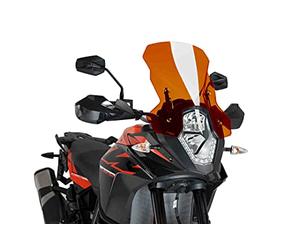 Puig 6494T High and aerodynamic Touring windscreen in 4 mm CN acrylic with rounded profile, flat upper area and deflectors that improve protection, Orange