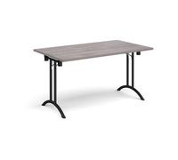 Rectangular folding leg table with black legs and curved foot rails 1400mm x 800mm - grey oak