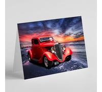 Red hot rod car on beach birthday card