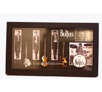 RGM8868 Beatles Miniature Guitar Collection includes three mounted replica Beatles miniature guitars bass drum in a shadowbox frame. A delightful gift for any Beatles fan