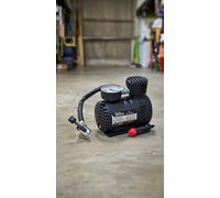 Roadstar 12V Air Compressor Inflator 300Psi, Pressure Gauge, 10Ft Cord, Multi Nozzle Kit For Tyres & Inflatables