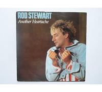 Rod Stewart - Stewart, Rod Another Heartache 7" Warner Bros W8631 EX/EX 1986 picture sleeve