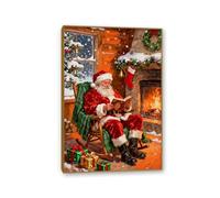 RXNHGJDS Christmas Wall Art Santa Claus Reading a Book Painting Canvas Prints Bedroom Living Room Fireplace Pictures Christmas Wall Decor Kids Nursery Gifts 75x50cm(30x20in) Teak Frame