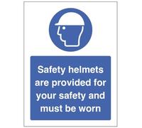 Safety helmets are provided for your safety and must be worn (semi rigid pvc safety sign)