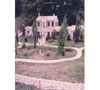 Scale Model of Graceland: This is a scaled model of the mansion of Graceland, the home of the late Elvis Presley. A family who were fans built it in their yard.