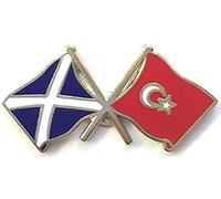Scotland and Turkey Friendship Flags Pin Badge Approximate size: 30mm x 14mm finish Long lasting hand crafted 'fired enamel' surface design Tarnish resistant metal badge UK company