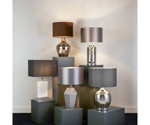 Searchlight Polygon table lamp with a glass base