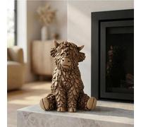 Sitting Hughie Highland Cow Ornament