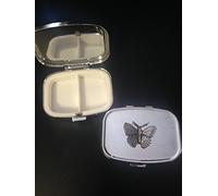 Small Butterfly C2 made of fine English Pewter on a travel silver rectangular metal pill box