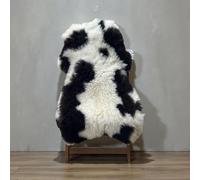 Small Spotty Jacob Genuine Sheepskin Rug, Natural Black and White Pattern. We will send the spottiest one we have