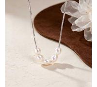 smile curve rice pearl necklace, five natural oval rice freshwater pearls, ultra thin silver box chain, soft iridescent luster, minimalist stackable neck jewelry for ladies