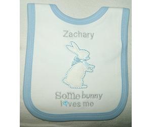 Some Bunny Loves Me Personalised Easter Bib. (White with Blue Trim)