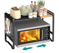 SONGMICS Expandable Microwave Shelf, Microwave Stand,Kitchen Corner Shelf | 41.5-64 cm Adjustable Width, Kitchen Storage Rack, Steel and Bamboo, 4 Hooks, Ink Black and Light Bamboo KCS060B01