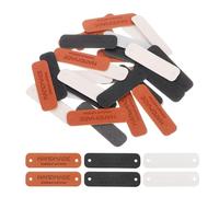 sourcing map 30 Pcs Handmade Leather Labels, PU Leather Handmade Tags Button with Hole Embossed Tag for Embellishment DIY Sewing Crafts, 55x15mm, Brown/Black/White