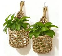 Space-saving plant stands, hand-crocheted openwork kitchen nets, and wall-mounted hanging planters, ideal for decorating the living room, kitchen and bathroom