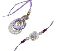 STORE INDYA Festival Set of Rakhi for Brother, Bhabhi | Indian Jewelry Pearl Bracelet Purple Lumba Rakhi Set, Greeting Card and Roli Chawal | Elegant Flower and San Judas Tadeo Design