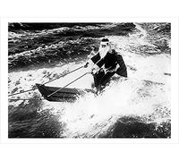 Surfing Santa, a 127 x 175mm Alternative Image winter themed Christmas card featuring a vintage black and white photo, message inside says Happy Christmas