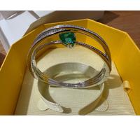 SWAROVSKI RHODIUM PLATED GREEN HYPERBOLA BANGLE BRACELET 5665327 NEW