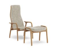 Swedese Lamino armchair and footstool oiled oak/sheepskin Moonlight (beige)