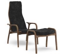 Swedese - Lamino Armchair With Footstool, Natural lacquered Walnut / Sheepskin Black - Black