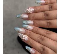 The almond fake claws crushed into the claws glos glitter sequin design cat's eyes