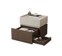 The Bedside Table on The Right Features a Hidden Storage Compartment