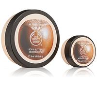 The Body Shop Shea Festive Bauble Gift Set Travel size Shea Body Butter 50ml: conditions and softens skin, provides up to 48 hours of ultra-rich moisture Shea Lip Butter 10ml: instant hydration