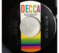 The Four Aces - a woman in love 45 rpm single