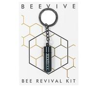 The Original Bee Revival Kit - Anthracite Grey keyring containing a bee food syrup to help a tired bee. On recycled packaging with BEE ID Tag