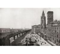 The overhead railway aka Dockers' Umbrella Liverpool England. The railway operated along the Liverpool Docks with lightweight electric multiple units from 1893 to 1956. From The Business Encyclopedia