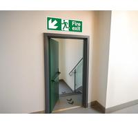 The Workplace Depot Fire Exit Down Left Direction Sign, 150H x450W, Vinyl | Fire Exit Down Left Direction Sign, 150x450mm, Green/White, Self-Adhesive Vinyl; For Offices & Warehouses.