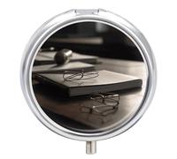 There is A Book on The Table Round Pill Box Travel Portable Pill Case 23 Compartment Medicine Metal Tablet Vitamin Holder Organizer for Purse Pocket