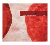 THREE TRAPPED TIGERS