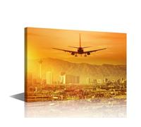 TISHIRON Cityscape Wall Art for Boys Room Airplane Flying into the Sky Above the City Wall Decor for Boys Room Aircraft Canvas Wall Art for Home Decor Skyline Sunset Painting 16" Wx24 Hx1 Panel